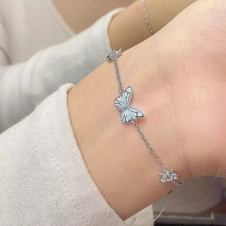 Bracelet papillon bleu lumineux
