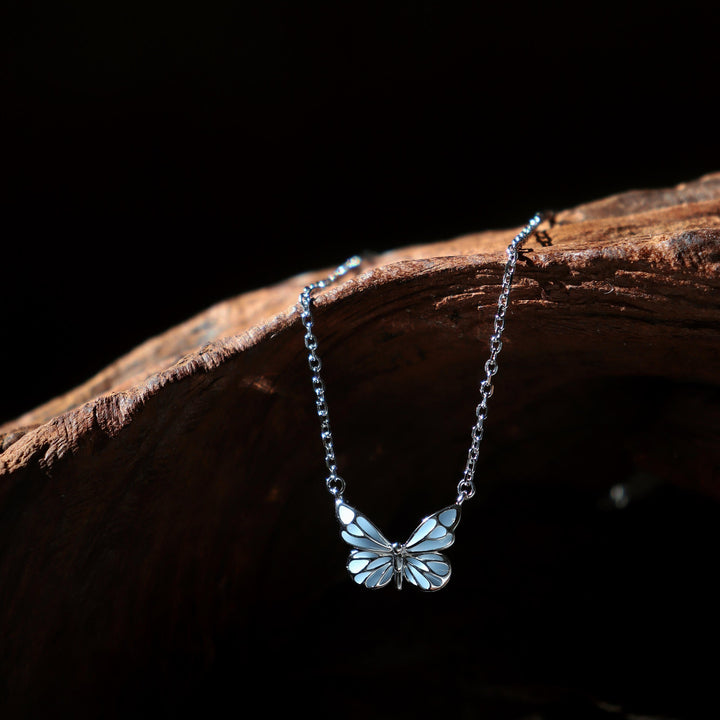 Bracelet papillon bleu lumineux