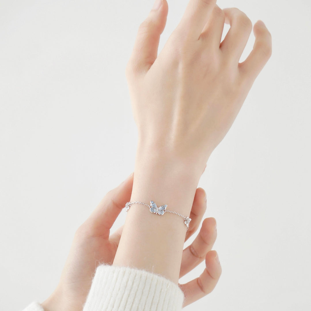 Bracelet papillon bleu lumineux