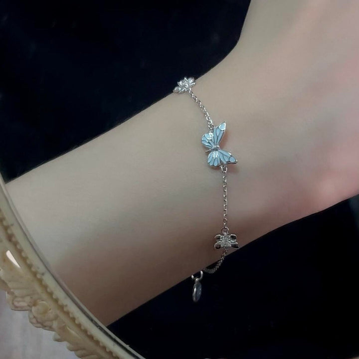 Bracelet papillon bleu lumineux