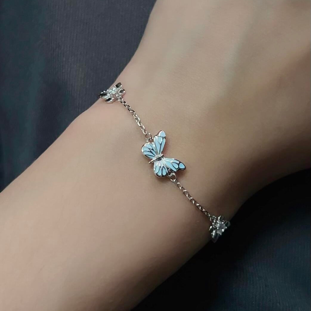 Bracelet papillon bleu lumineux